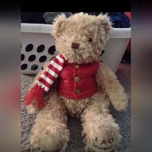 FAO Schwarz 12" stuffed bear with winter Vest and scarf. NWOT